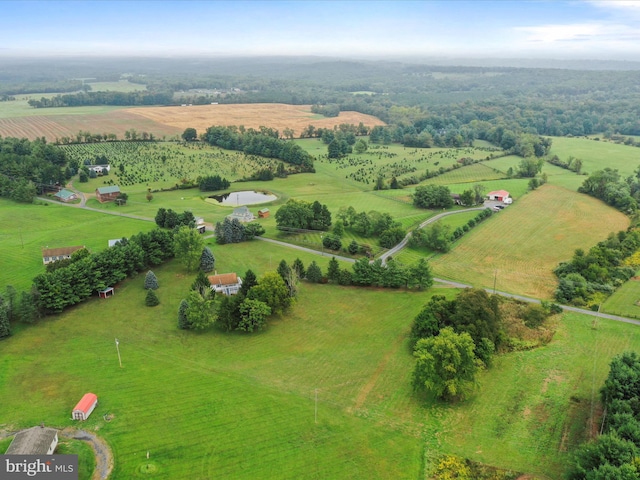 birds eye view of property featuring a rural view