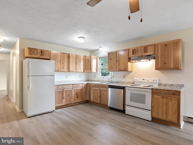 kitchen featuring a textured ceiling, white appliances, ceiling fan, and light hardwood / wood-style flooring