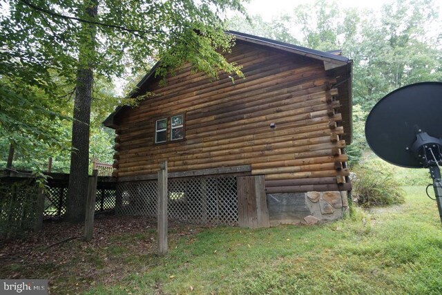 view of home's exterior featuring a lawn