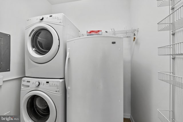 washroom with stacked washer / dryer