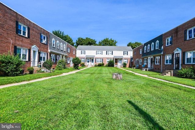 view of community with a yard