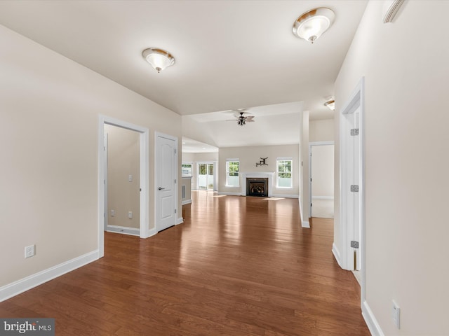 interior space featuring dark hardwood / wood-style flooring and ceiling fan