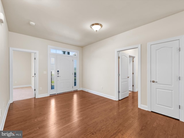 foyer entrance featuring hardwood / wood-style floors