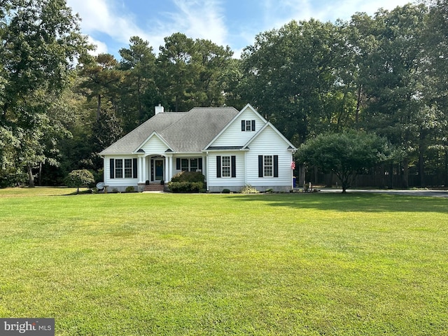 view of front of home with a front lawn