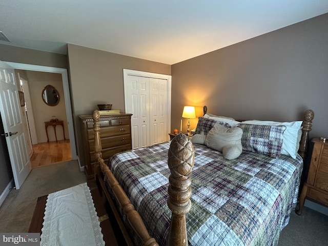 bedroom with carpet flooring and a closet