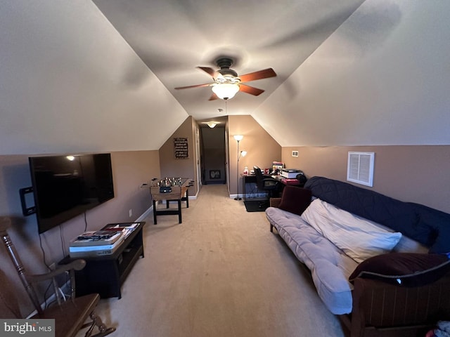 carpeted living room featuring lofted ceiling and ceiling fan