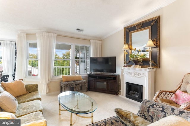 carpeted living room featuring ornamental molding