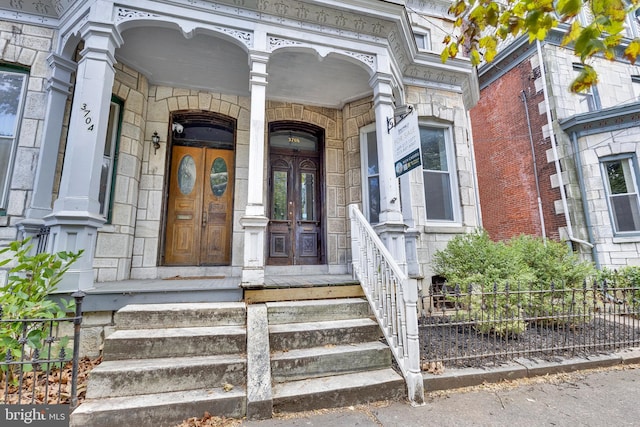 entrance to property with covered porch