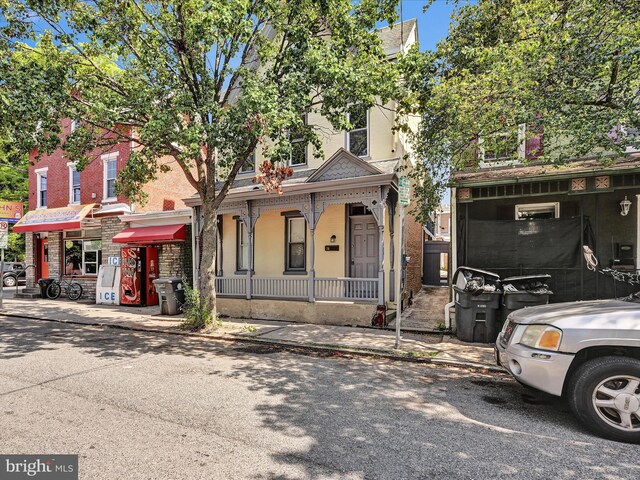 view of front of home featuring covered porch