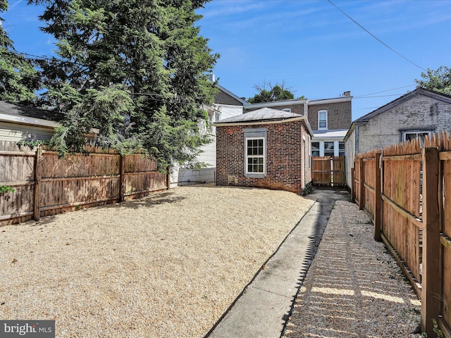 back of house featuring a patio area