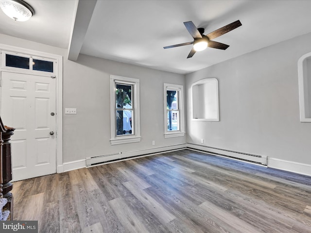 foyer with a baseboard heating unit, ceiling fan, and hardwood / wood-style floors