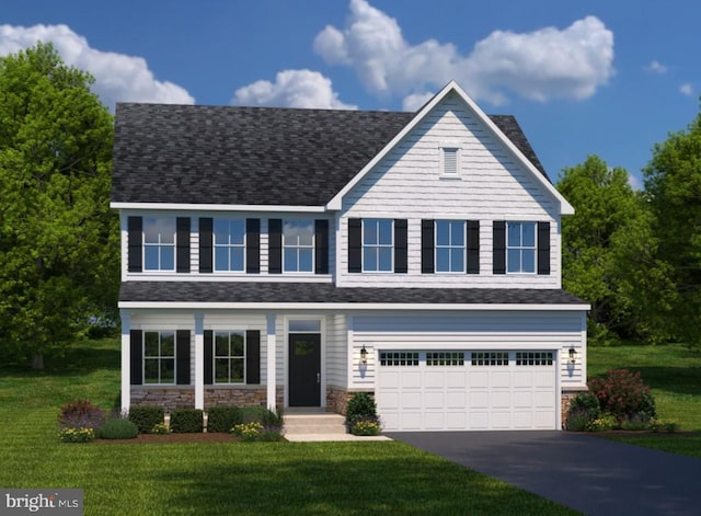 view of front facade featuring a front lawn and a garage