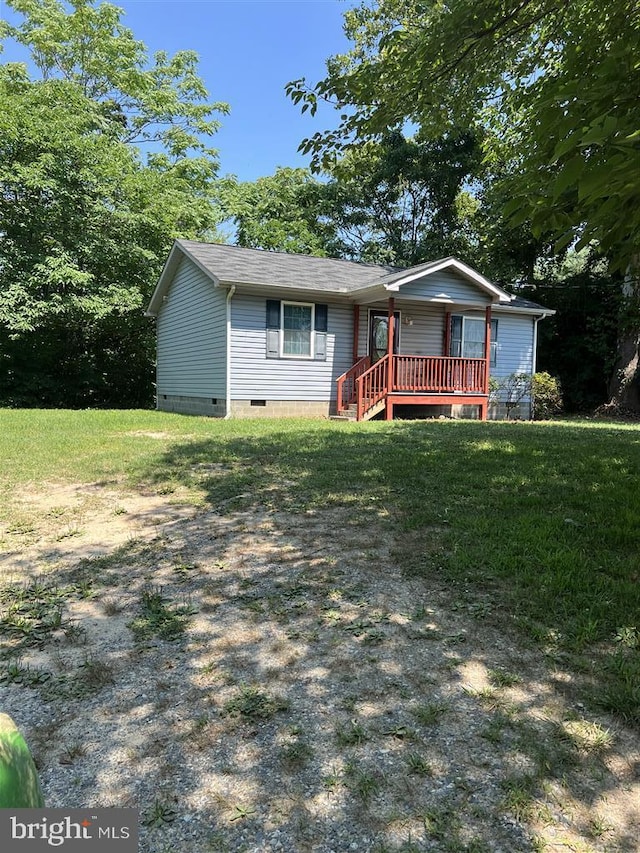 view of front of property with a front lawn