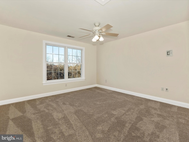 empty room with carpet and ceiling fan