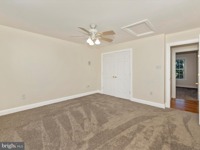 unfurnished bedroom featuring ceiling fan, carpet floors, and a closet