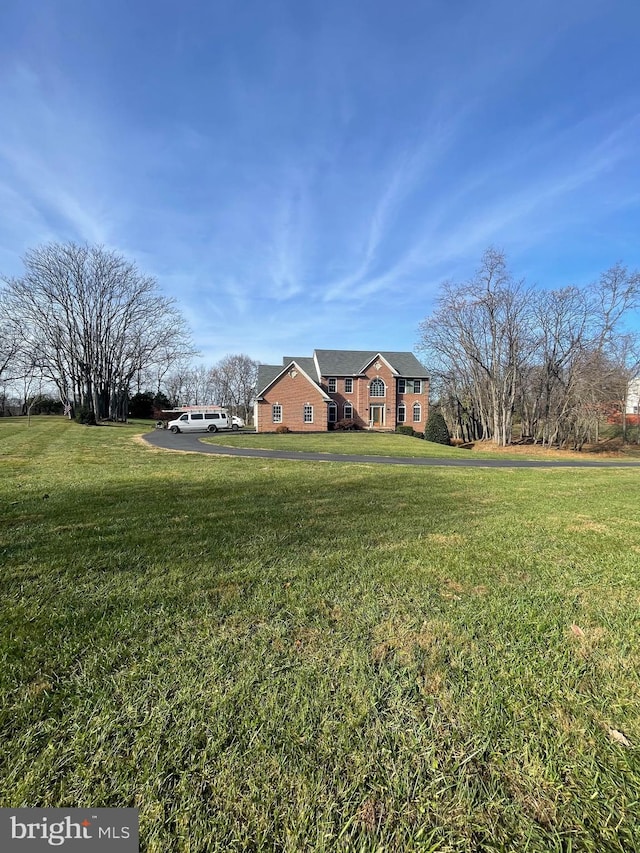 view of front of house with a front lawn