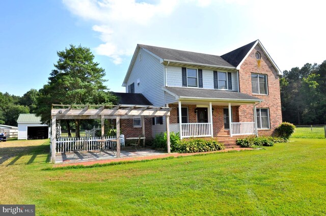 exterior space featuring a front yard, a pergola, and covered porch