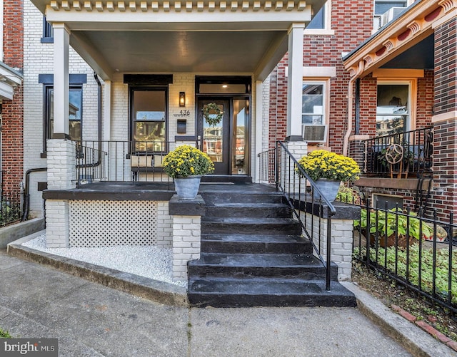 property entrance featuring a porch