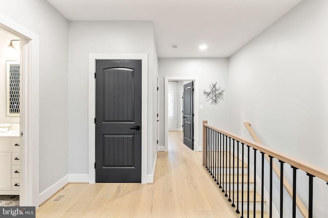 hallway featuring light wood-type flooring