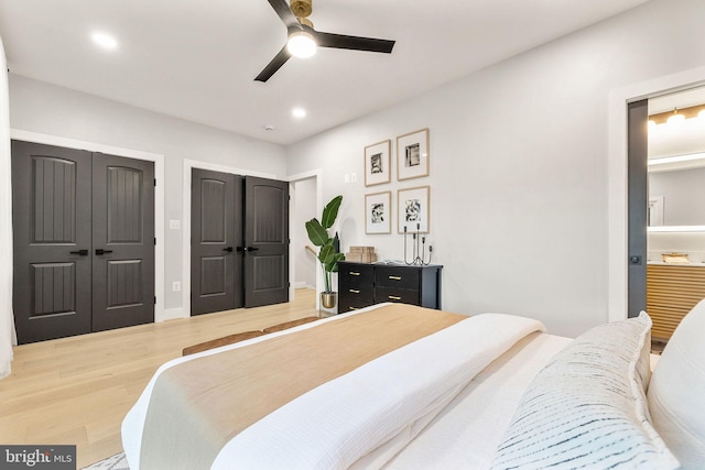 bedroom with wood-type flooring and ceiling fan