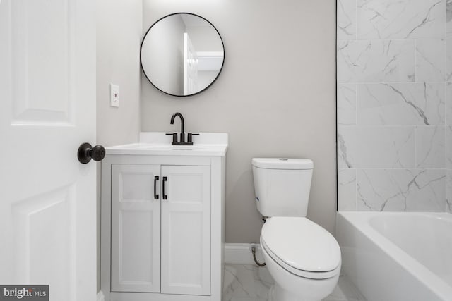 full bathroom with tiled shower / bath, vanity, and toilet