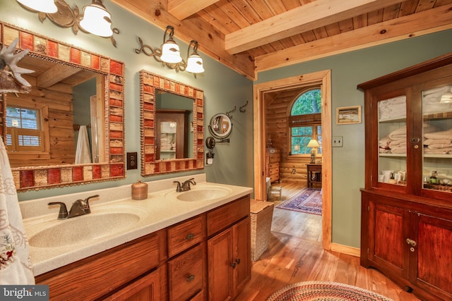 bathroom with beamed ceiling, vanity, wood ceiling, and hardwood / wood-style flooring