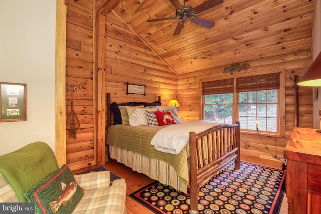 bedroom with hardwood / wood-style floors, vaulted ceiling, ceiling fan, and wooden ceiling