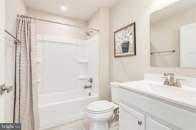 full bathroom featuring tile patterned flooring, vanity, toilet, and shower / bathtub combination with curtain