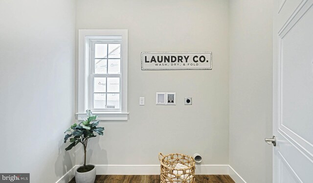 laundry area featuring washer hookup, dark wood-type flooring, and electric dryer hookup