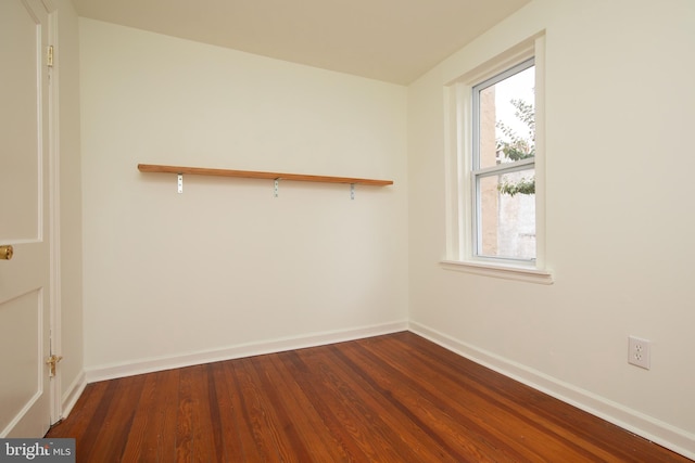 empty room featuring hardwood / wood-style flooring