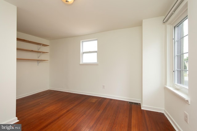 interior space with dark wood-type flooring