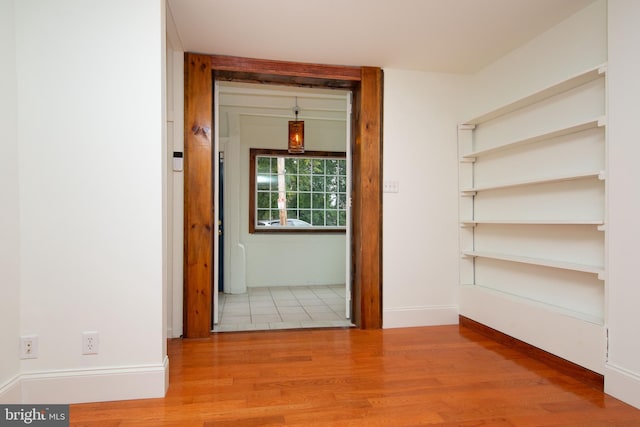 unfurnished room featuring light hardwood / wood-style floors