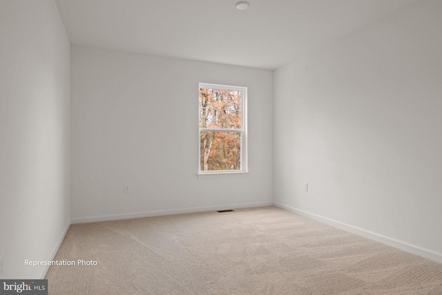 view of carpeted spare room