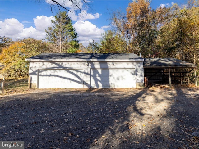 garage with a carport