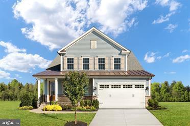 view of front of home featuring a front lawn and covered porch