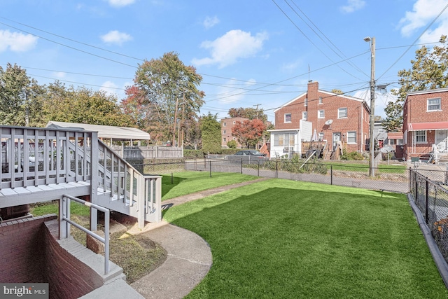 view of yard featuring a wooden deck