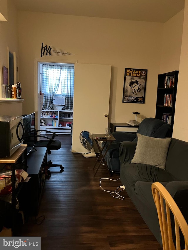 living room featuring dark hardwood / wood-style floors