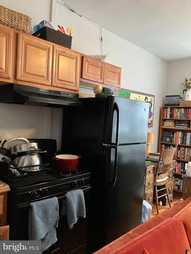 kitchen featuring black appliances