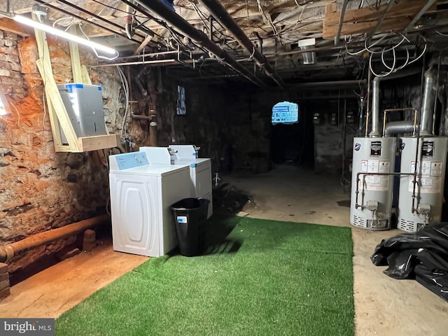 basement with independent washer and dryer, water heater, and electric panel