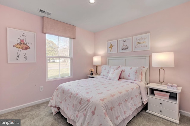 bedroom with light carpet