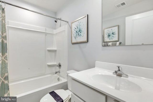 full bathroom with vanity, toilet, and shower / tub combo with curtain