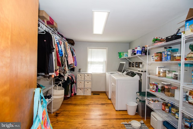 washroom featuring light hardwood / wood-style floors and independent washer and dryer