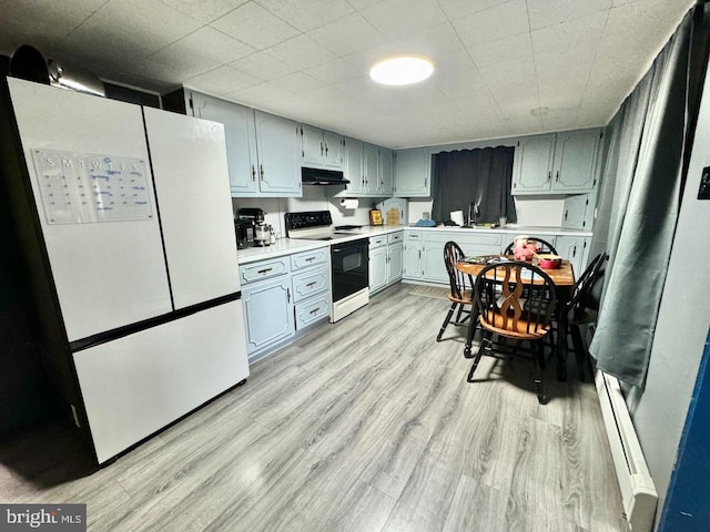 kitchen with light hardwood / wood-style floors, white appliances, sink, and a baseboard radiator