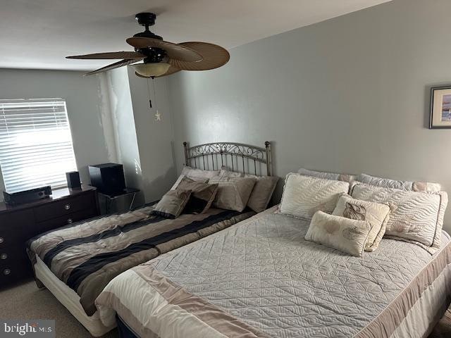 bedroom featuring carpet flooring and ceiling fan