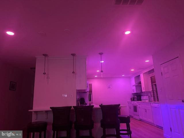 dining room featuring light hardwood / wood-style floors