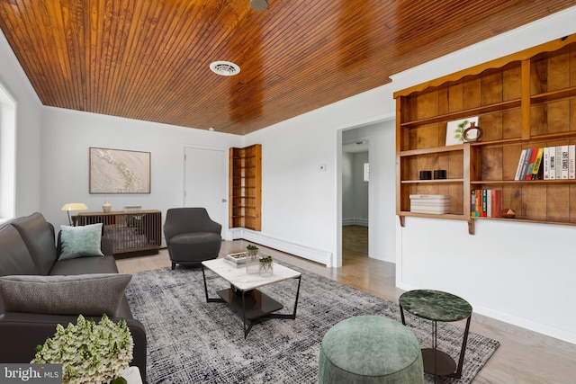 living room featuring wood ceiling and a baseboard radiator