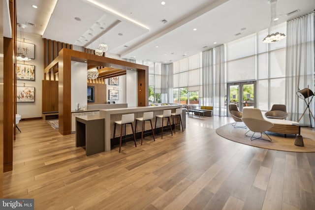 interior space with a notable chandelier and sink