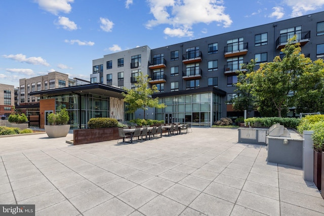 view of community featuring a patio and area for grilling