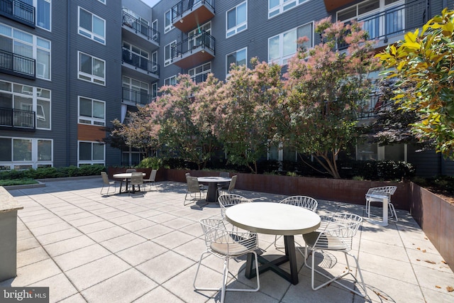 view of patio / terrace with a balcony