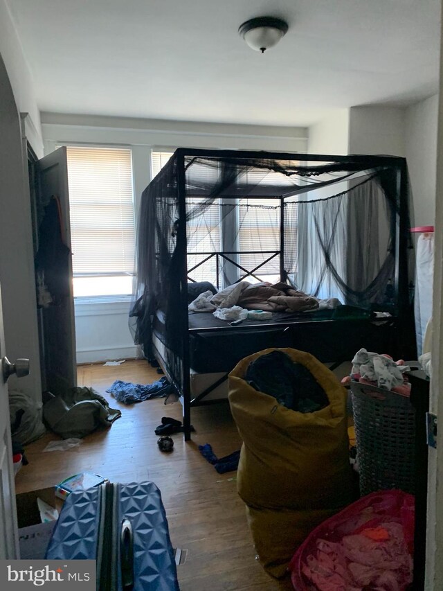 bedroom featuring hardwood / wood-style flooring